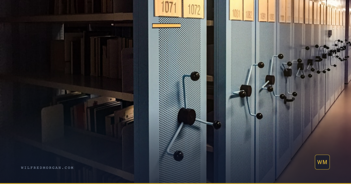 Scene: Towering archive shelves stacked with document records in a dim library